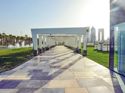 Paving leading through the colonnade